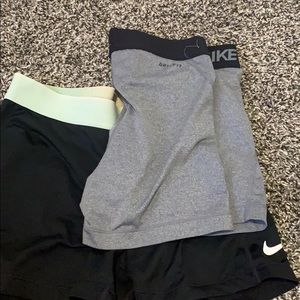 Two pairs of Nike pros